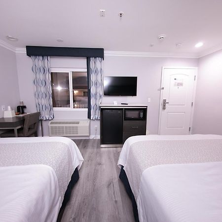 Travelodge Inn & Suites By Wyndham West Covina Quarto foto